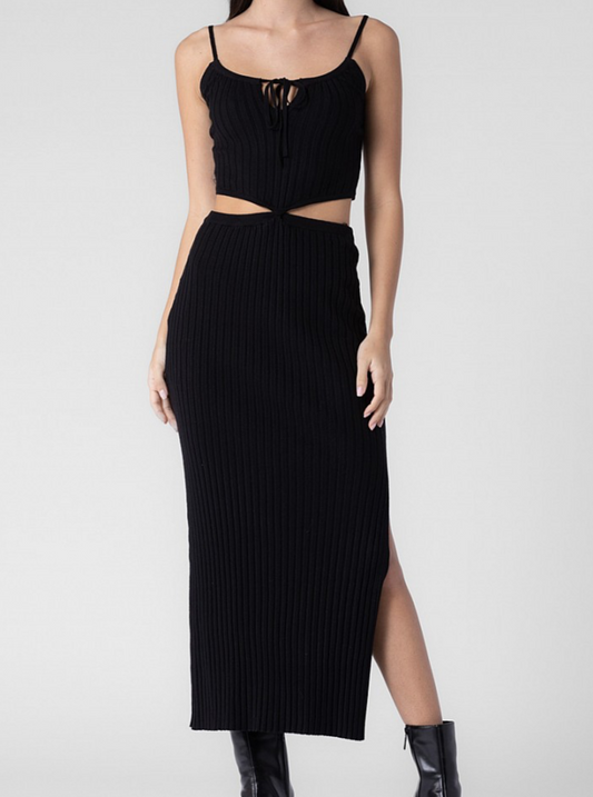 Black sleeveless rib knit dress with cutouts at waist and side slit. Midi dress. Calf length. 
